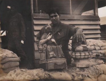 charlie w buddhas ernest malone in doorway